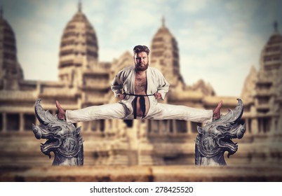 Karate fighter does the splits - Powered by Shutterstock