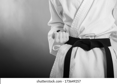 karate girl with black belt posing - Powered by Shutterstock