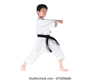 Karate Kid Performing Reverse Punch (cross Punch) In Front Stance.