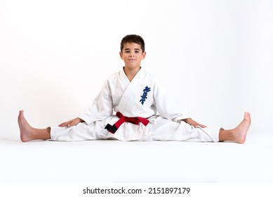 Karate Kid Stretching On A White Background. Which Means: The Last Truth Associated.