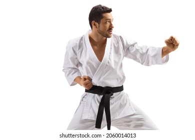 Karate man in kimono exercising combat sport isolated on white background