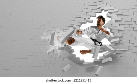 Karate Master Breaking With Leg Brick Wall. White Background