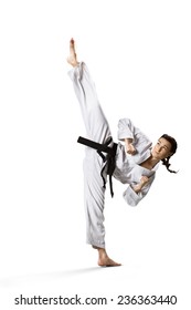 Karate Woman In Action Isolated In White