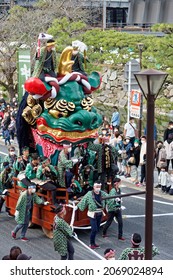 Karatsu, Japan - november 3, 2021 : massive float is drawn through the streets during annual Karatsu Kunchi traditional festival.