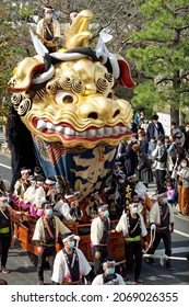 Karatsu, Japan - november 3, 2021 : a massive float is drawn through the streets during annual Karatsu Kunchi traditional festival.