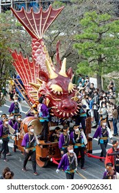 Karatsu, Japan - november 3, 2021 : a massive float is drawn through the streets during annual Karatsu Kunchi traditional festival.