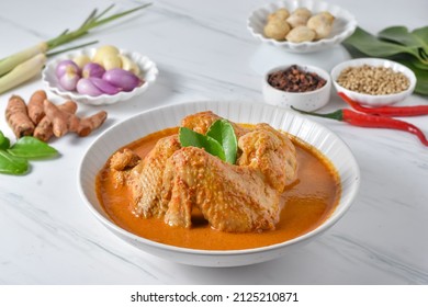 Kare Ayam (Gulai Ayam) or Kari Ayam or Chicken Curry is Chicken Meat in turmeric and coconut milk soup. Served with ingredients garlic, onion, turmeric, lemongrass, nutmeg, chili, and others.