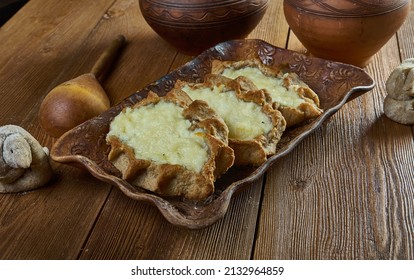 Karelian pasty with potatoes - traditional pasties usually had a rye crust, but the North Karelian and Ladoga Karelian - Shutterstock ID 2132964859