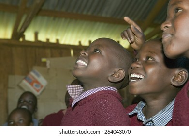 Karimba School With School Children Smiling In Classroom In North Kenya, Africa