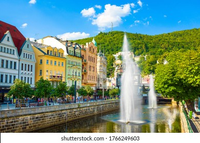 Karlovy Vary, Czech republic - July 18, 2016: Tepla River  with fountains and  Promenade street in Karlovy Vary