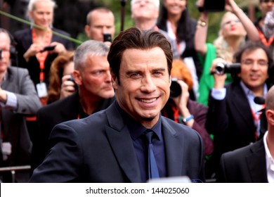 KARLOVY VARY - JUNE 28: Famous actor John Travolta arrived to present the film "Killing Season" at the International Film Festival, Karlovy Vary on June 28, 2013, Czech Republic