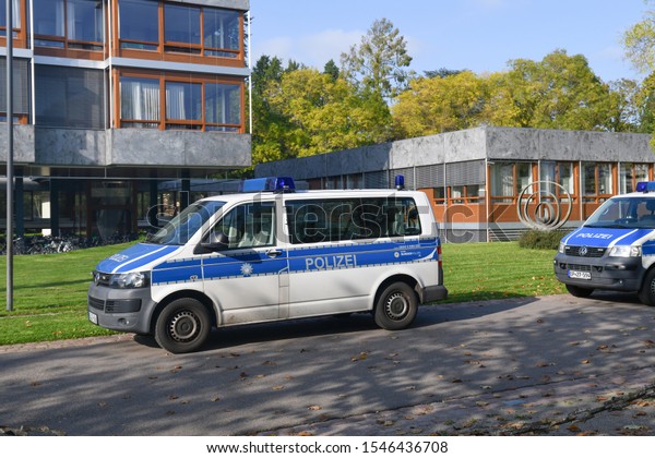 Karlsruhe, Germany -\
October 2019: Police car parking in front of Federal Constitutional\
Court in Germany