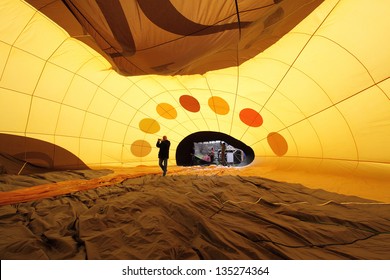 KARLSTEJN, CZECH REPUBLIC - APRIL 14: Baloon Inside. Unidentified Crew  Preparing Hot Air Baloon To Fly. Baloon Event On April 14, 2013 In Karlstejn, Czech Republic.