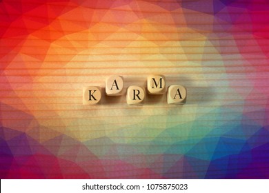 Karma Word On Wooden Cubes. Karma Concept