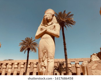 The Karnak Temple Complex, commonly known as Karnak, comprises a vast mix of decayed temples, chapels, pylons, and other buildings near Luxor, in Egypt. 
