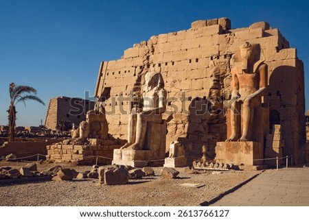  Karnak Temple is dedicated to the temple complex of Ancient Egypt in honor of the god Amun-Ra, his wife Mut and son Khons. Thebes, Karnak, Luxor, Egypt. 