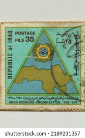 Karnal, Haryana, India -August 11th, 2022-Closeup of a commemorative postal stamp of Iraq depicting Arab Working Organization.