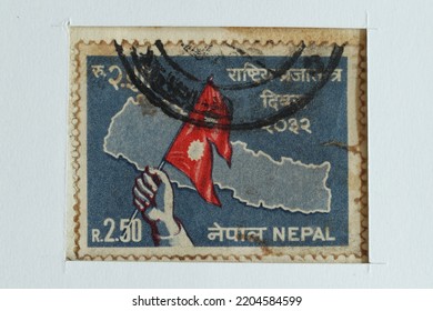 Karnal, Haryana, India -September  20th, 2022-Closeup Of A Commemorative Postal Stamp Of Nepal Depicting Map  And National Flag Of Nepal, National Republic Day.