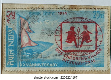 Karnal, Haryana, India -September 28th, 2022-Closeup Of A Commemorative Postal Stamp Of Nepal Depicting SOS  Children 's Village International.