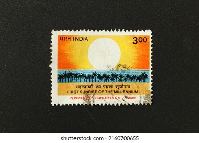Karnal, Haryana, India-May 22, 2022-Closeup of a commemorative postal stamp of India depicting First Sunrise of the Millennium -Greetings 1.1.2000.