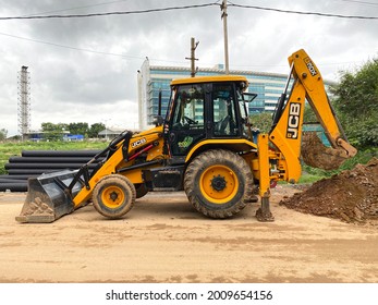 Karnataka, July 2021 : The modern excavator JCB performs excavation work on the construction site