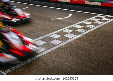 Kart crossing the finish line - Shutterstock ID 142653133
