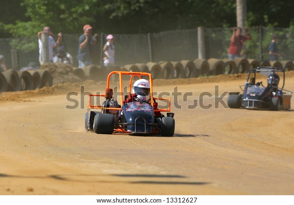 Karts Racing On Dirt Track Stock Photo Edit Now 13312627