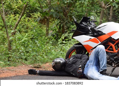 Kasaragod,Kerala,India- August 20 2020 View Of A Motorcycle Accident, A Rider Falls To The Road From The Bike