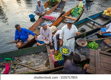 KASHMIR, INDIA - 20th SEPT 2019; Morning view of traditional floating market at Dal Lake of Kashmir, India.
