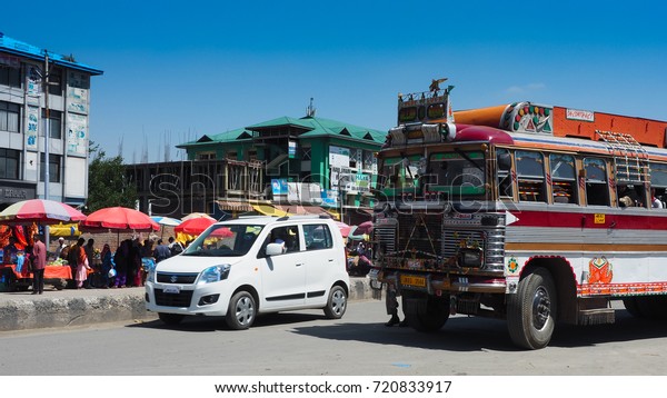 KASHMIR, INDIA - JULY 1, 2017: Traffic from\
Srinagar-Ladakh Road go to Sonamarg mountain, Jammu and Kashmir\
state, India\
