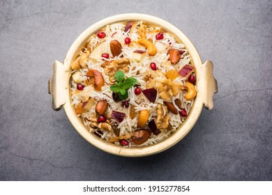 Kashmiri pulao made of Basmati rice cooked with spices and flavored with Saffron and dry fruits