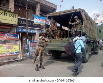 Kashmir/India-Oct 10, 2018: Indian Army Soldiers Performing Their Duty In Kashmir In A Crowded Street.