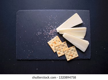 Kasseri Greek Cheese With Crackers And Salt.