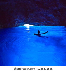 Kastellorizo / Greece - August 24 2016 : People Swimming In The Blue Cave