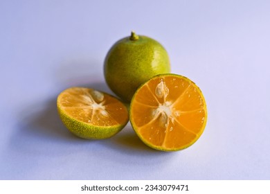 Kasturi orange or calamansi orange with the scientific name Citrus x microcarpa. This orange smells good, and has a sour taste when it is ripe, and bitter when it is still unripe