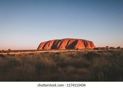 KATA TJUTA NATIONAL PARK, NORTHERN TERRITORY / AUSTRALIA -DECEMBER 2017: Uluru is a large sandstone formation in the heart of Australia. Uluru is sacred to the Aboriginal people of the area. - Shutterstock ID 1174115434