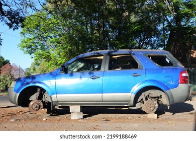 KATHERINE, NT - AUG 17 2022:A Stolen Vandalized Vehicle Abandoned On Bricks In City Street. A Passenger Light Commercial Vehicle Is Stolen Approximately Every 13 Minutes In Australia