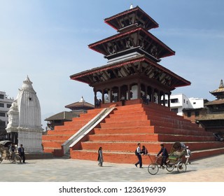 Kathmandu. Nepal. 03.15.05. Local People Near A Pagoda In Durbar Square In The Patan District Of Kathmandu, Nepal.