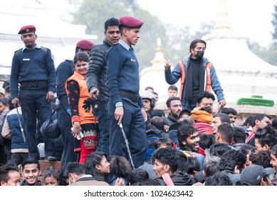 Kathmandu, Nepal, 13 February 2018 police officers controlling the crowd of people during the Hindu festival 'Maha Shivaratri'. Maha shivaratri is a festival dedicated  to Lord Shiva.