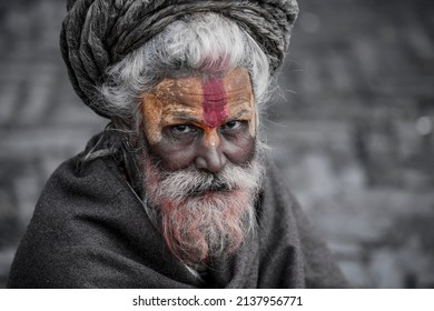 Kathmandu, Nepal- April 20,2019 : Sadhu-Indian Holymen sitting in the temple. In Hinduism, Sadhu is a common term for a mystic, an ascetic, practitioner of yoga. 