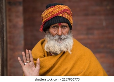 Kathmandu, Nepal- April 20,2019 : Sadhu-Indian Holymen sitting in the temple. In Hinduism, Sadhu is a common term for a mystic, an ascetic, practitioner of yoga. 
