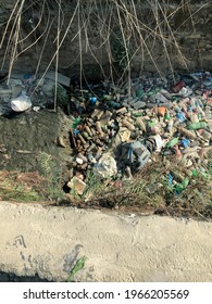 Kathmandu, Nepal, April 26, 2021: A Plastic Pile On The Green Grass, A Natural Environment Issue, Nature Contamination Is Not Plastic Breaking Down