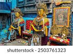 KATHMANDU, NEPAL - August 12, 2024: The Buddhist community display effigies of Dipankara Buddhas statue during the Pancha Dan festival in Lalitpur.