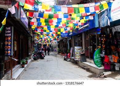 KATHMANDU, NEPAL - DEC 10, 2018: Street Of Thamel - A Commercial Neighborhood In Kathmandu, The Capital Of Nepal Has Been The Centre Of The Tourist Industry For Over Four Decades.