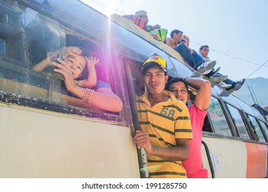 Kathmandu, Nepal, July 3, 2011: Nepalese People On The Local Bus Roof