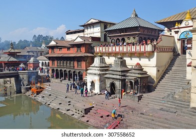 Kathmandu, Nepal, November, 13, 2012, Pashupatinath complex, cremation of the dead on the banks of the sacred Bagmati river.  In spring 2015 complex  was partially destroyed during the earthquake