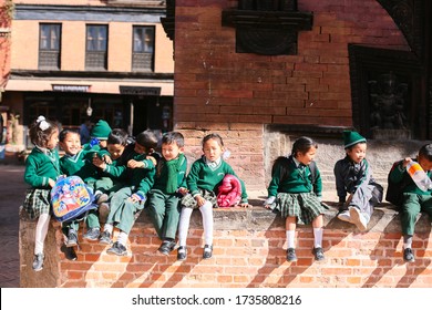 Kathmandu, Nepal - November 17 2019: Happy school children posing for camera during their field-visit. School students on their educational tour.