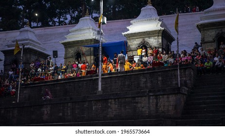Kathmandu, Nepal - November 2019: Aarati ceremony at Pashupatinath Temple. Worshipping evening prayer, sacred shrine, hinduism religion