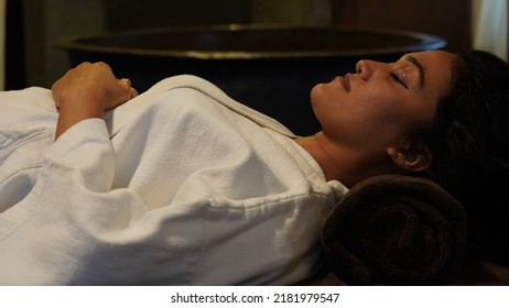 Kathmandu - Nepal - November 2021: Women receiving a head massage in a Spa in Kathmandu, Nepal.