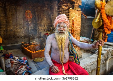 KATHMANDU, NEPAL - OCTOBER 21, 2015 : Portrait of Shaiva sadhu (holy man) with traditional long beard in Pashupatinath Temple